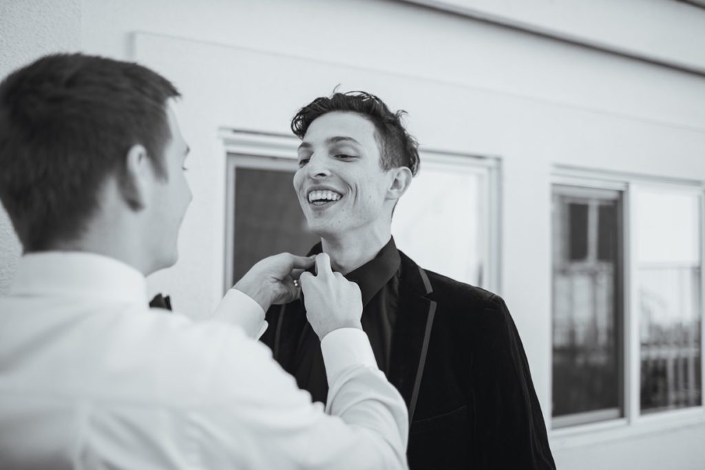 groom in velvet suit