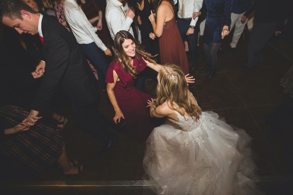 bride and bridesmaids dancing