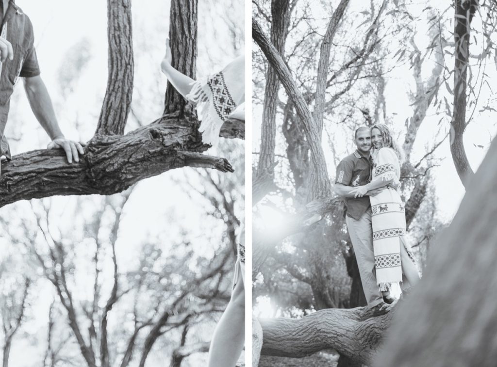 bride and groom climbing a tree
