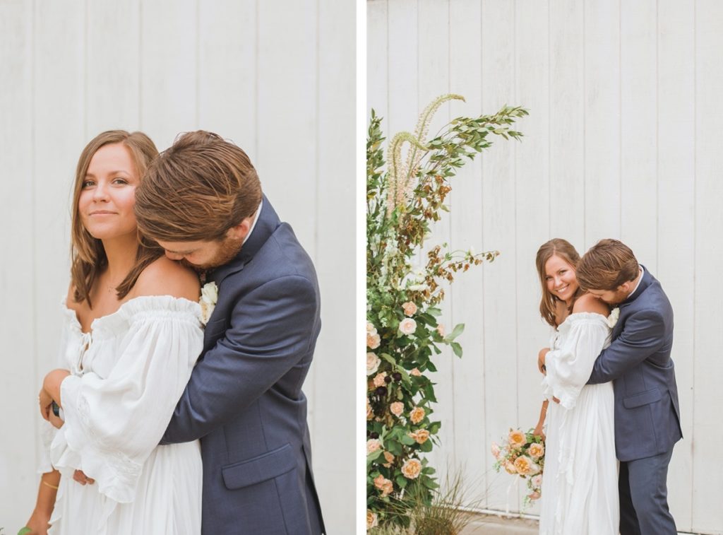 groom kissing bride's shoulder