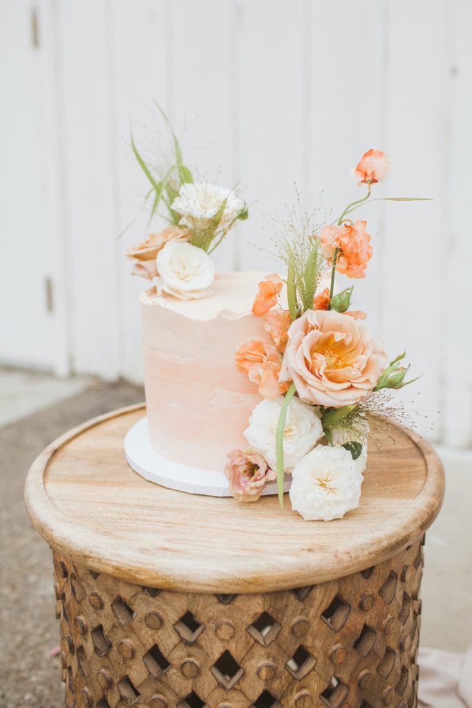 boho wedding cake with peach