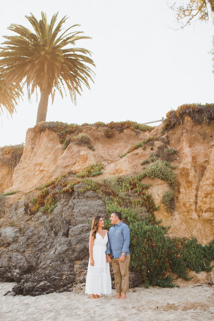 couple standing on butterfly beach