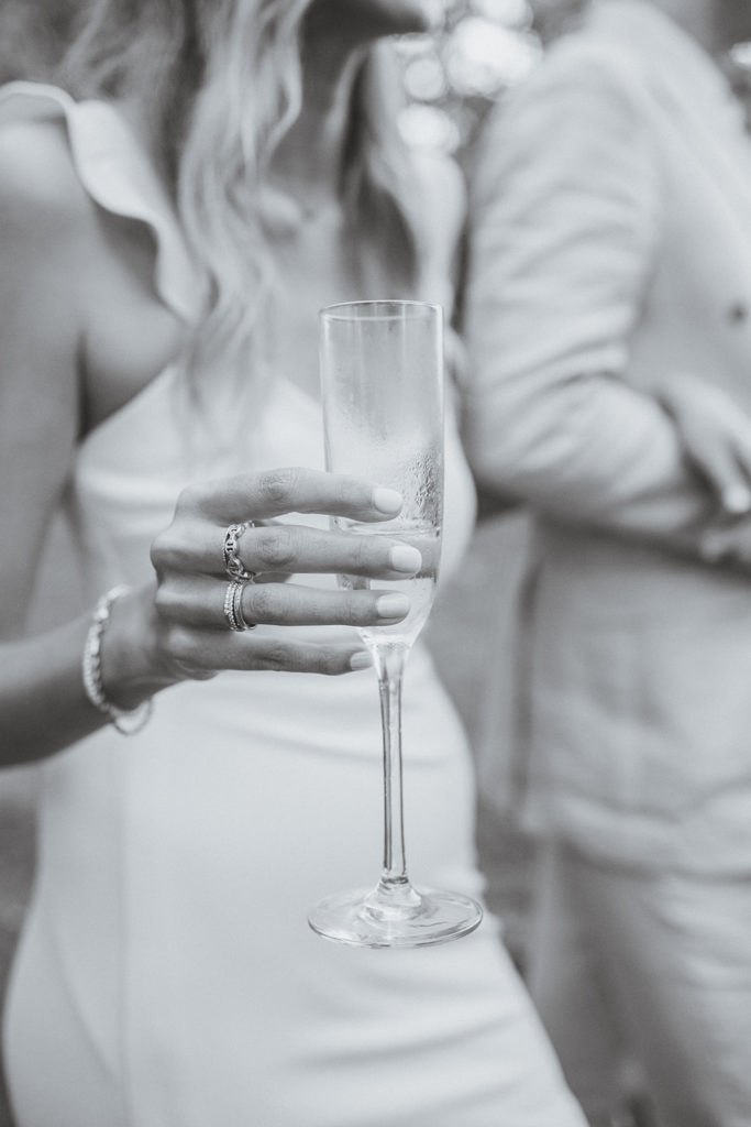 bride holding champagne flute